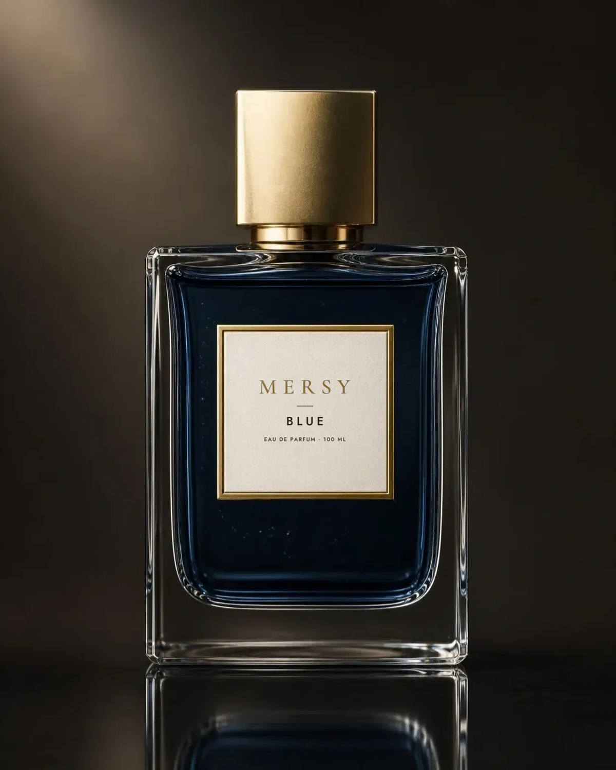 The MERSY Blue bottle: square glass with deep blue liquid, a gold cap and an ivory MERSY label.