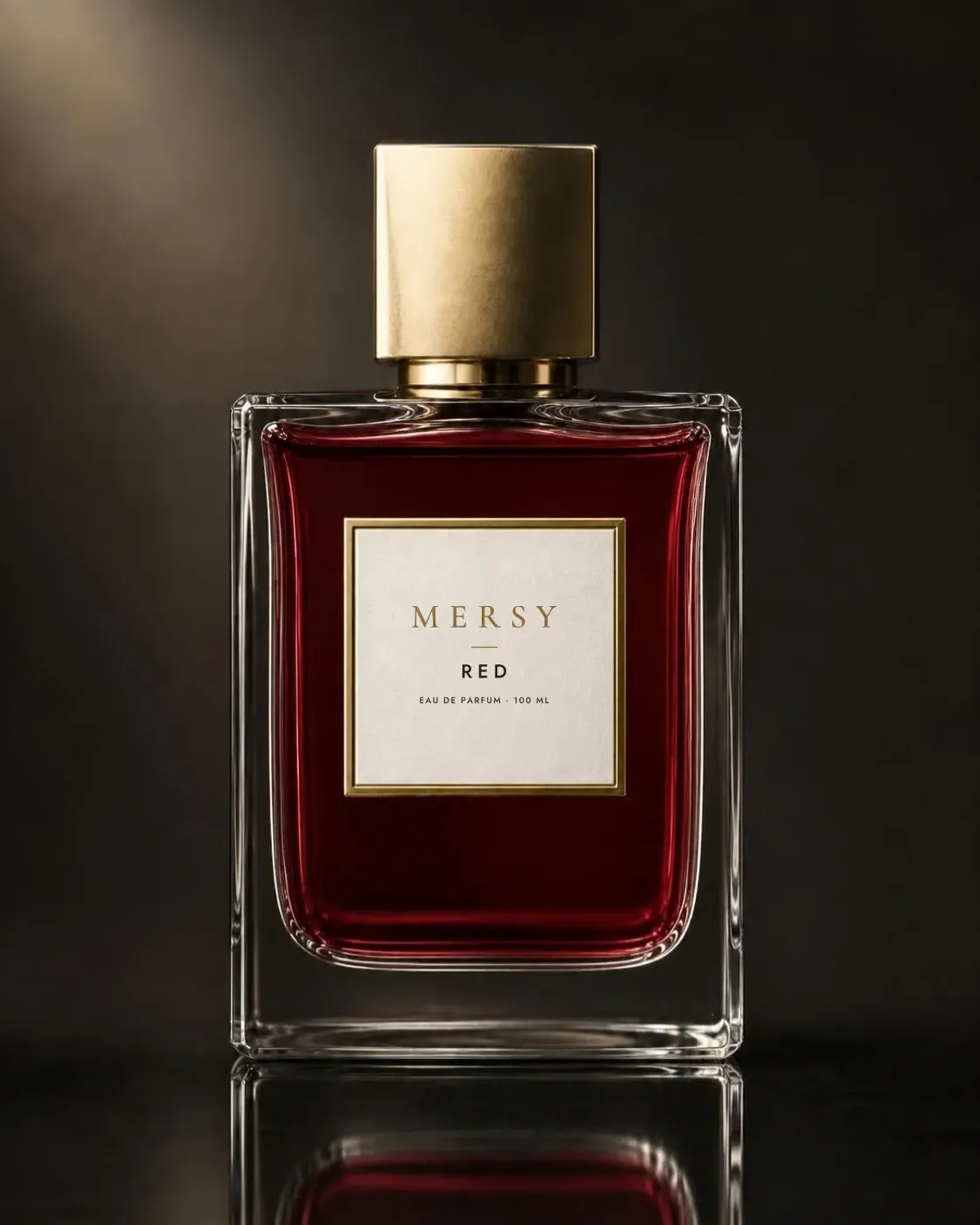 The MERSY Red bottle: square glass with garnet-red liquid, a gold cap and an ivory MERSY label.